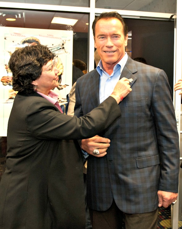 Sheriff Lupe Valdez gives Arnold Schwarzenegger the Sheriff's Star Sheriff Lupe Valdez gives Arnold Schwarzenegger the Sheriff's Star